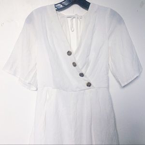 White Faux Wrap Romper with Button Detailing